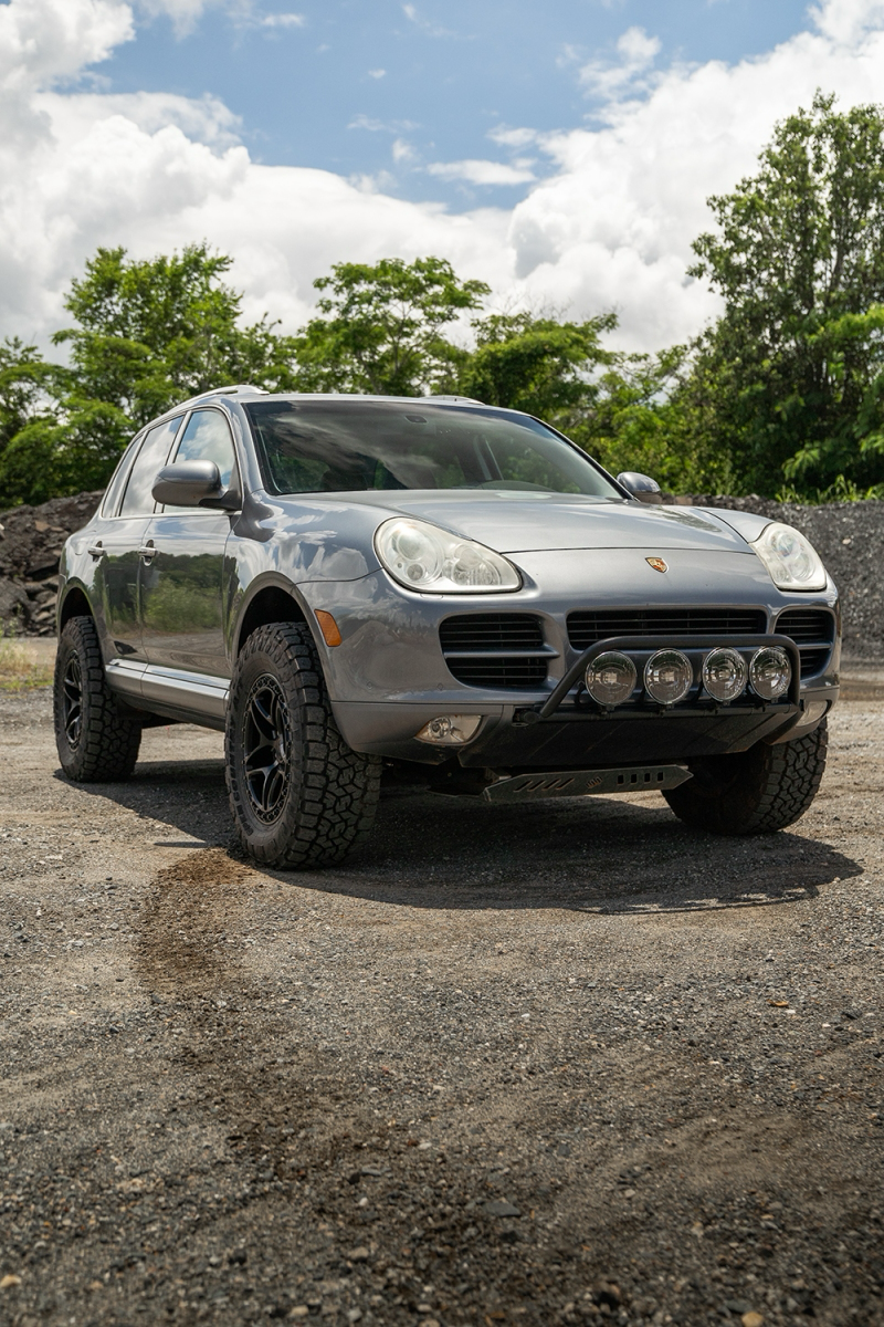 Grey Porsche Cayenne 955 TerraForge4x4 overland build with bullbar and off-road tyres
